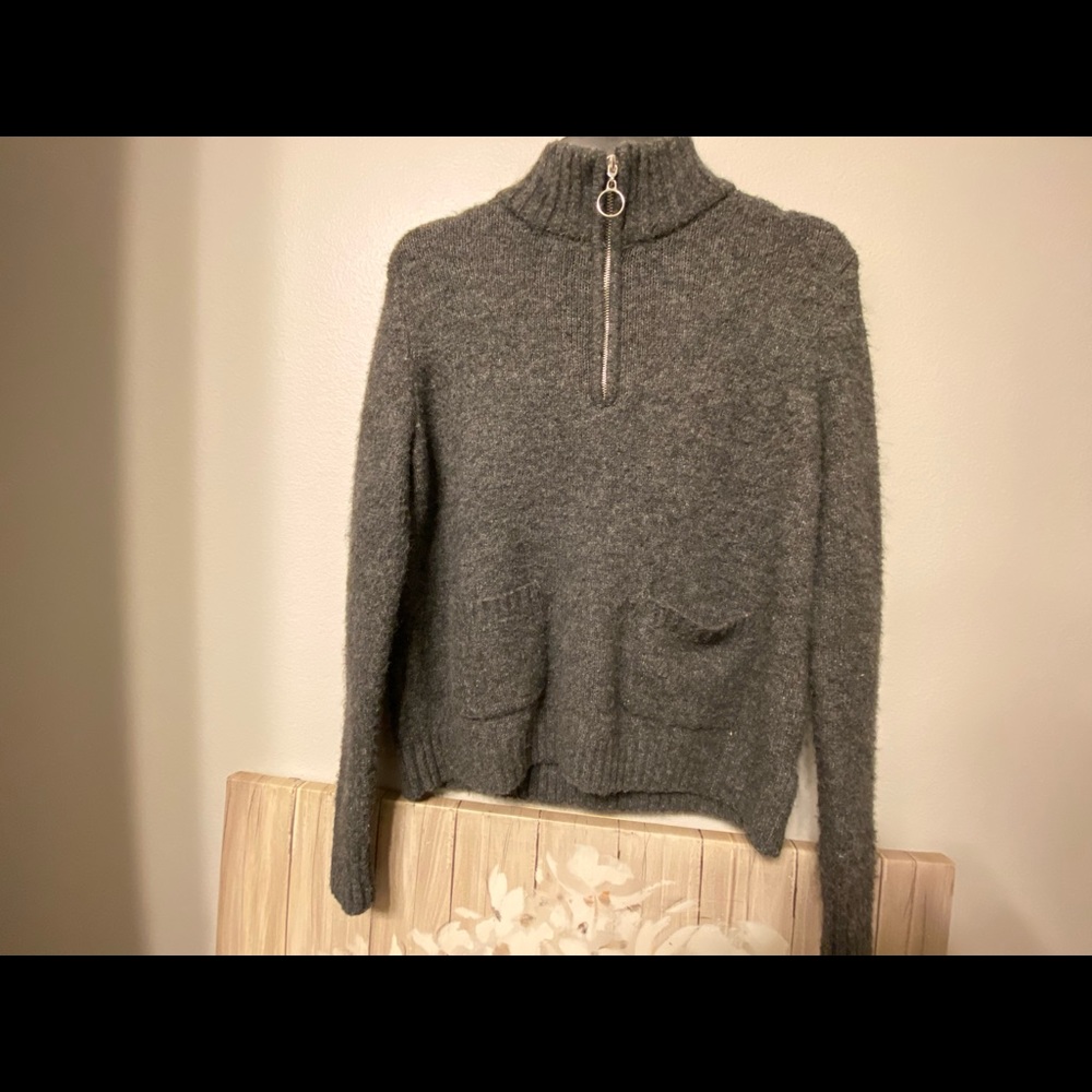 Long sleeved fleeced sweater with quarter zipper